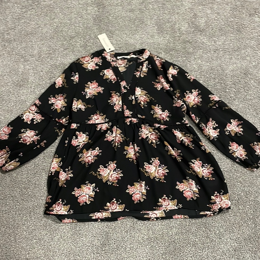 Francesca’s woman’s floral blouse